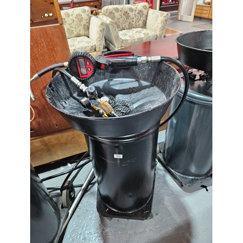 392 - An oil drum with a Graco air powered pump