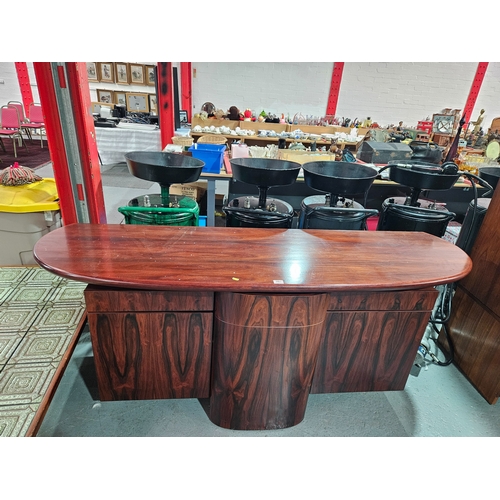 397 - A rosewood Skovby sideboard

Depth 57cm, Width 200cm, Height 83cm