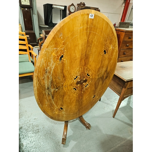 425 - A mahogany inlaid tilt top table

Measures: Width 88cm, Length 118cm, Height 70cm