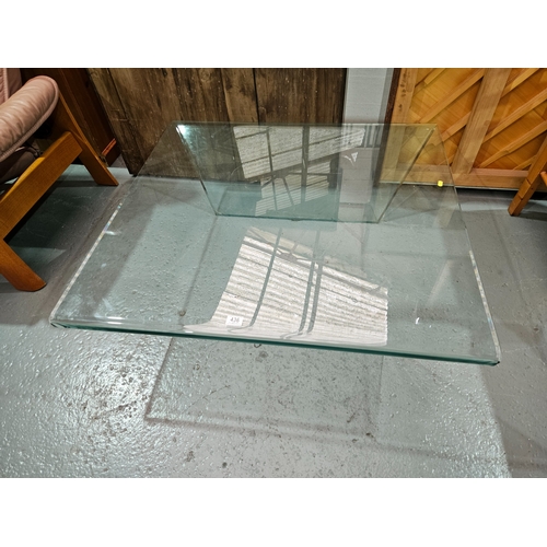 436 - A glass coffee table

Height 34cm, Width 100cm, Depth 105cm