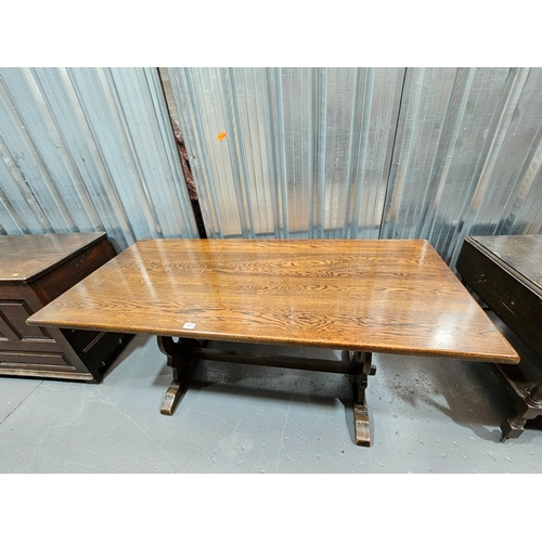 489 - An oak plank top dining table

Height 76cm, Width 168cm, Depth 76cm