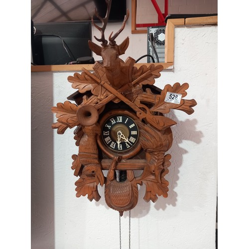 528 - A large twin weight cuckoo clock