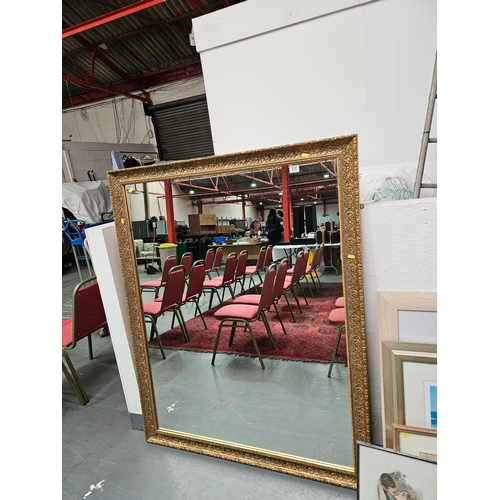 535 - A large gold framed mirror 120cm x 150cm