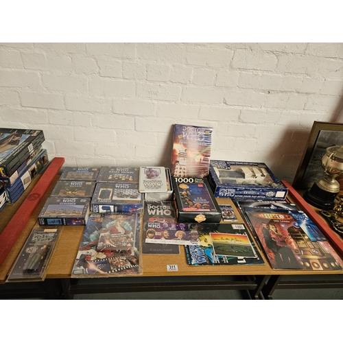 311 - A collection of Dr Who collectibles including calendars, boxed Harlequin miniatures, action figure p... 