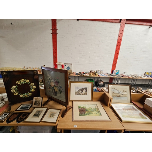 334 - Two wooden framed fire screens, framed watercolours - mostly Welsh - and prints and engravings