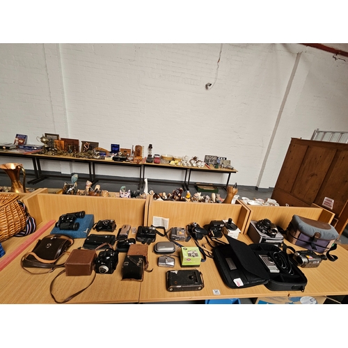 341 - A collection of vintage cameras and binoculars - Ilford, Kodak, Chinon, Praktica, Sony, etc