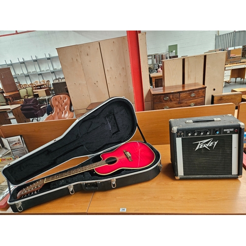 346 - A Tanglewood Odyssey 12 string acoustic/electric guitar in hard case together with a Peavey Backstag... 