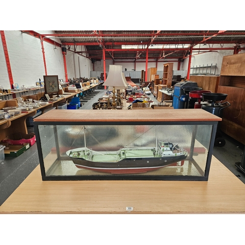 355 - A model ship with brass fittings in metal and glass display case 19