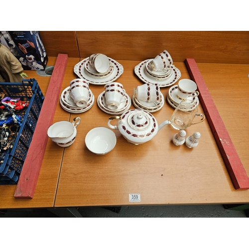 359 - A full Paragon 12 place setting tea set including tea pot (1 cup is missing)