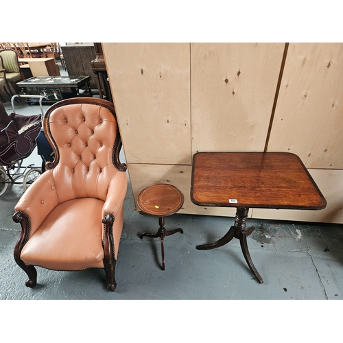 400 - A leatherette Edwardian armchair together with a wine table and a small tilt top table