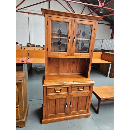 425 - A pine dresser 

Height 196cm, Width 100cm, Depth 46cm