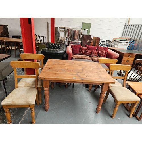 433 - A pine dining table with 4 chairs