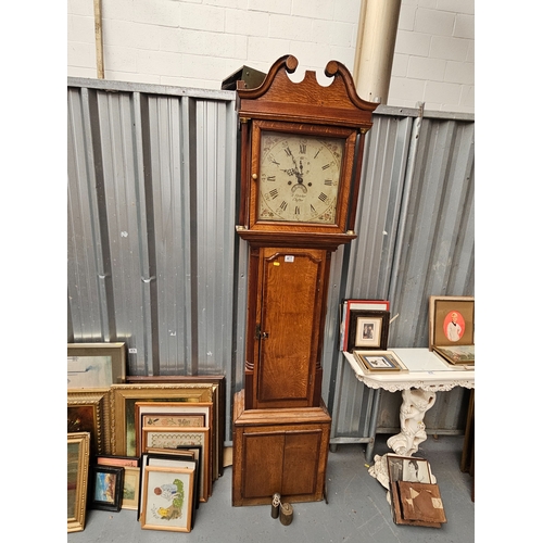 477 - An oak cased 8 day grandfather clock