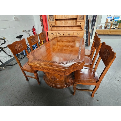 482 - A hardwood dining table with 6 chairs