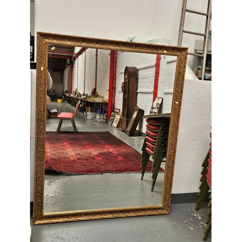 492 - A large gold framed mirror 120cm x 150cm