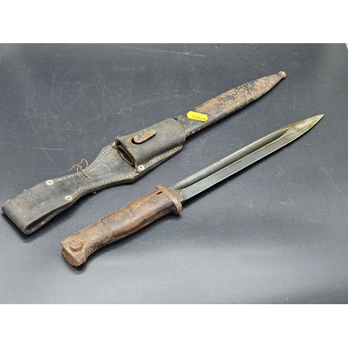 517 - A military bayonet and scabbard