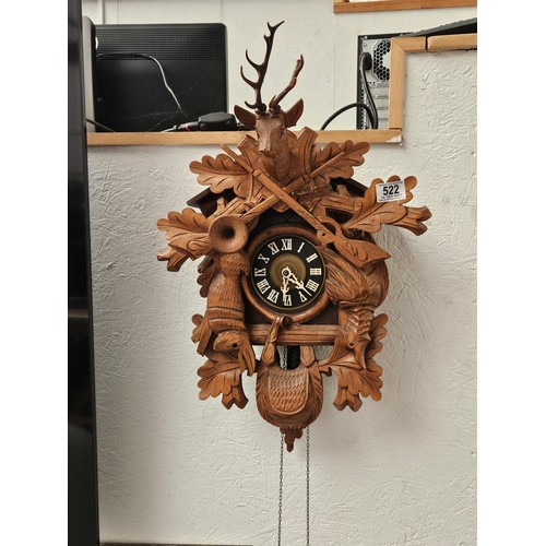 522 - A large twin weight cuckoo clock