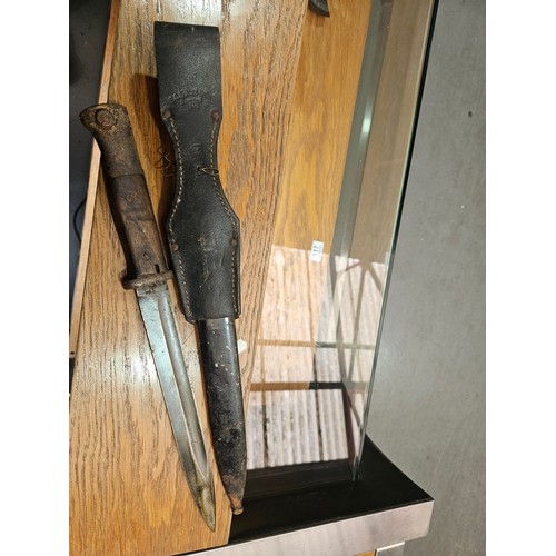 517 - A military bayonet and scabbard