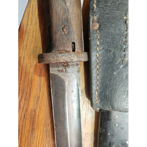 517 - A military bayonet and scabbard