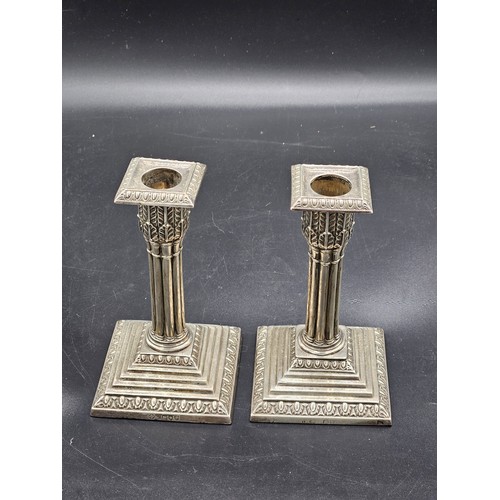 500 - A pair of hallmarked silver Corinthian column candlesticks - height 6 inches - good condition - hall... 