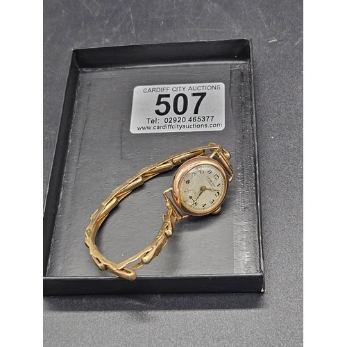 507 - A ladies 9k gold watch with 9k gold strap - J. W. Benson - London - weight including movement, glass... 