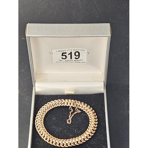 519 - A 9k gold bracelet. Weight 16.1 grams