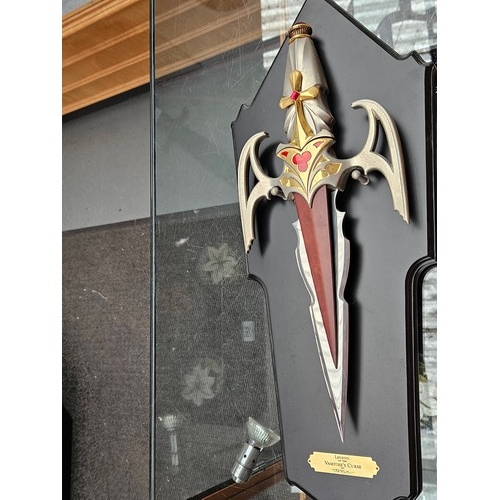 546 - Fantasy daggers and knives - Sirens of the Dragon, Vampires Curse - both mounted and a display case ... 