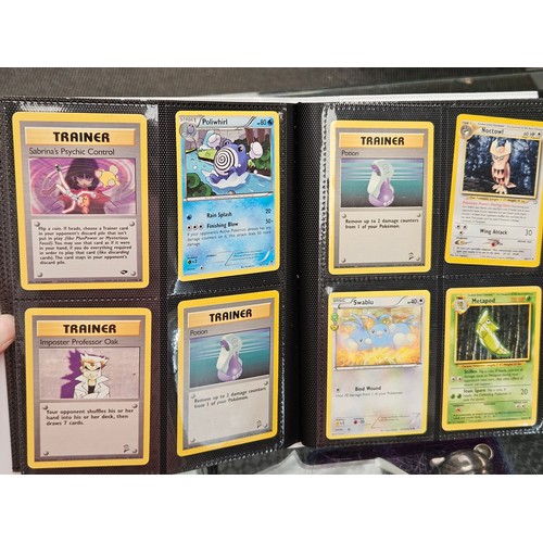 548 - Pokemon cards, tins, figure and videos