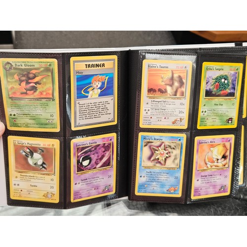 548 - Pokemon cards, tins, figure and videos