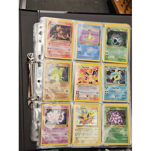 548 - Pokemon cards, tins, figure and videos