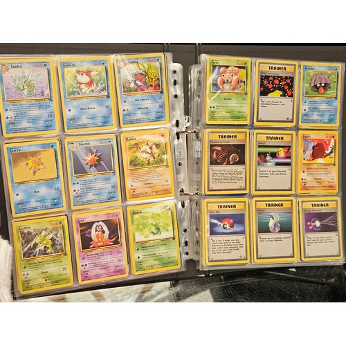 548 - Pokemon cards, tins, figure and videos