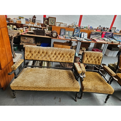 384 - Edwardian wooden framed 2 seater sofa with matching armchair on castors