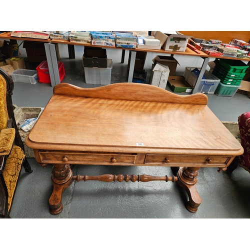 386 - A Victorian 2 drawer desk

Height 74cm, Width 120cm, Depth 52cm