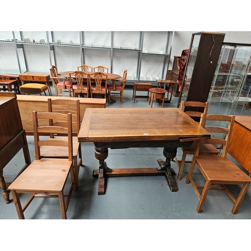 400 - An oak draw leaf extending table with 4 pine chairs