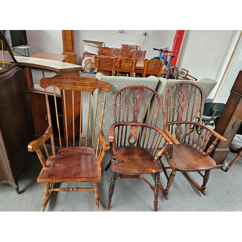 411 - 1 oak Windsor style chair together with an oak Windsor style rocking chair and 1 other rocking chair