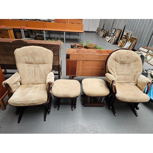 428 - A pair of upholstered seated Dutailier rocking/gliding chairs with matching footstools