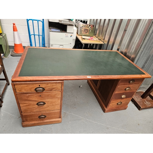 445 - A teak twin pedestal desk with leatherette insert

Dimensions: Height 76cm, Width 160cm, Depth 84cm