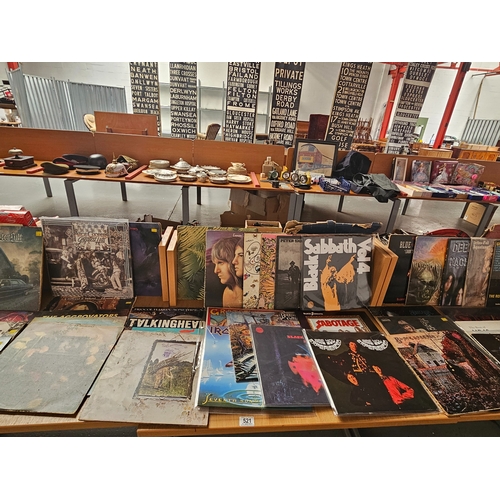 521 - A large collection of vinyl LPs - Bowie, Rude Boys, Alice Cooper, Black Sabbath, Procol Harum, etc