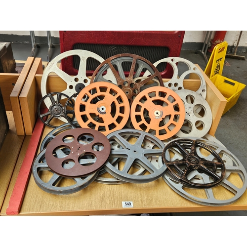 549 - A collection of vintage film reels of various sizes