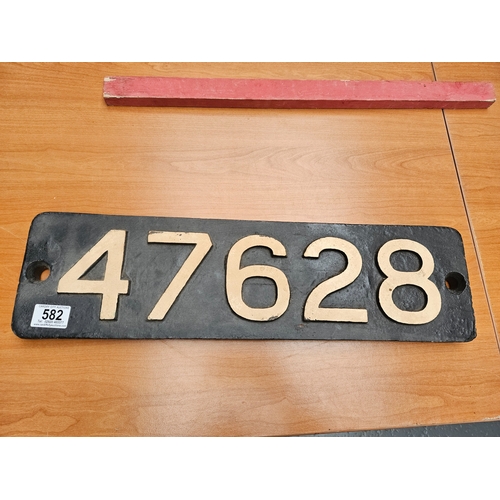 582 - A Railway cast iron number sign believed to be a smoke box number sign - 22 inches long and 6 inches... 