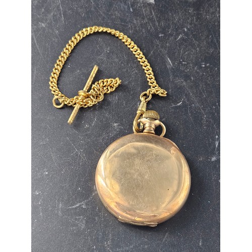 812 - An Elgin gold plated pocket watch and chain - appears to work but no guarantee