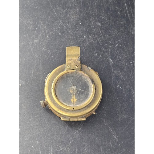 816 - An early brass compass - dated 1917 - believed to be military - not working