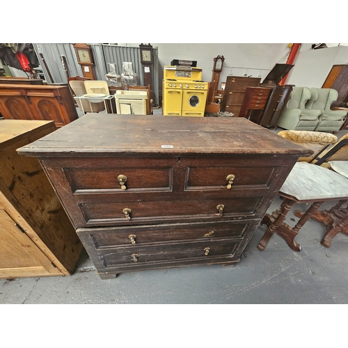 600 - An oak coffer with open top lid and one large bottom drawer

Measurements: Height 96cm, Width 98cm, ... 