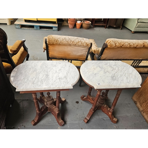 601 - A pair of marble top occasional tables