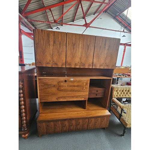 607 - A three sectioned wall unit, believed to be Danish

Height 188cm, Width 128cm, Depth 60cm