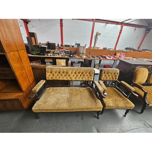 608 - Edwardian wooden framed 2 seater sofa with matching armchair on castors