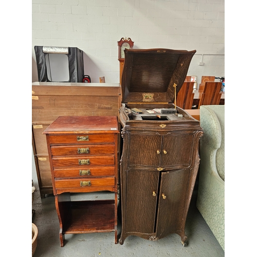 637 - A sheet music cabinet together with an oak gramophone cabinet on castors (missing 1 castor)