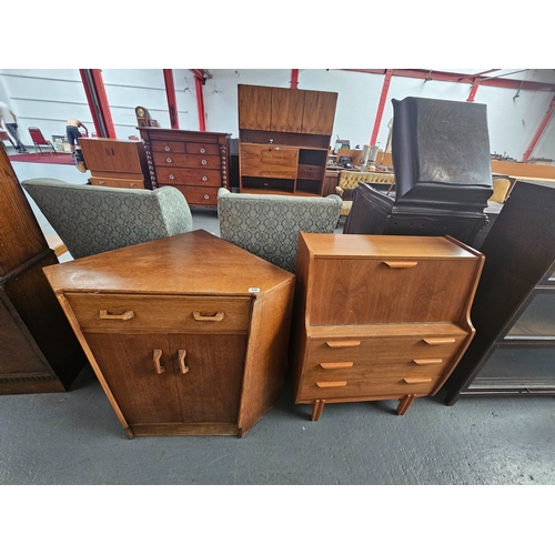 642 - A teak bureau together with a corner cabinet