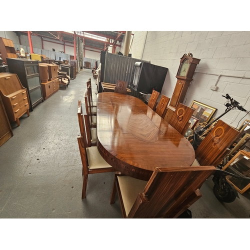 652 - A large rosewood boardroom/dining table and eleven chairs. Purchased in 1925 by Ebbw Vale Steelworks... 