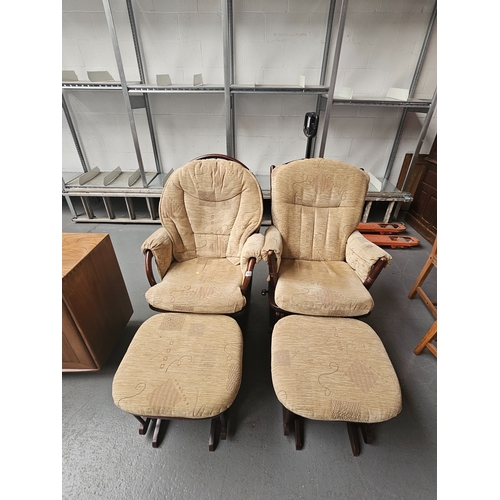 663 - A pair of upholstered seated Dutailier rocking/gliding chairs with matching footstools